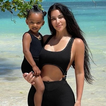 Kim Kardashian Twinning With Daughter Chicago in Black Swimsuits