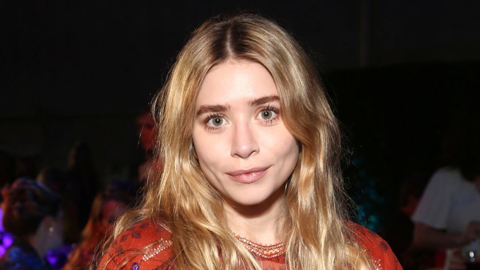 Ashley Olsen Spotted in a Sexy Bright Blue Blouse While Out With Friends in NYC
