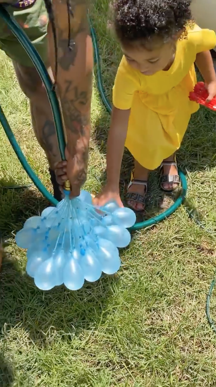 Family Fun! Kylie Jenner and Travis Scott Have a Water Balloon Fight With Daughter Stormi Webster