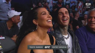 Kourtney Kardashian and Boyfriend Travis Barker Tongue-Kiss for Cameras During UFC Date Night in Vegas
