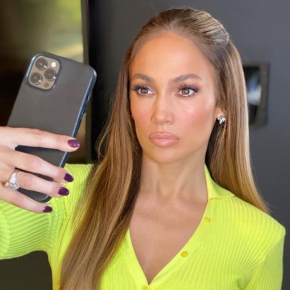 Jennifer Lopez Flaunts Her Curves in a Sexy Neon Cut-Out Dress: Photos!