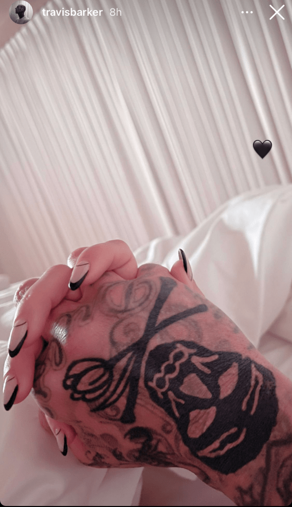 Travis Barker and Kourtney Kardashian Hold Hands in Bed
