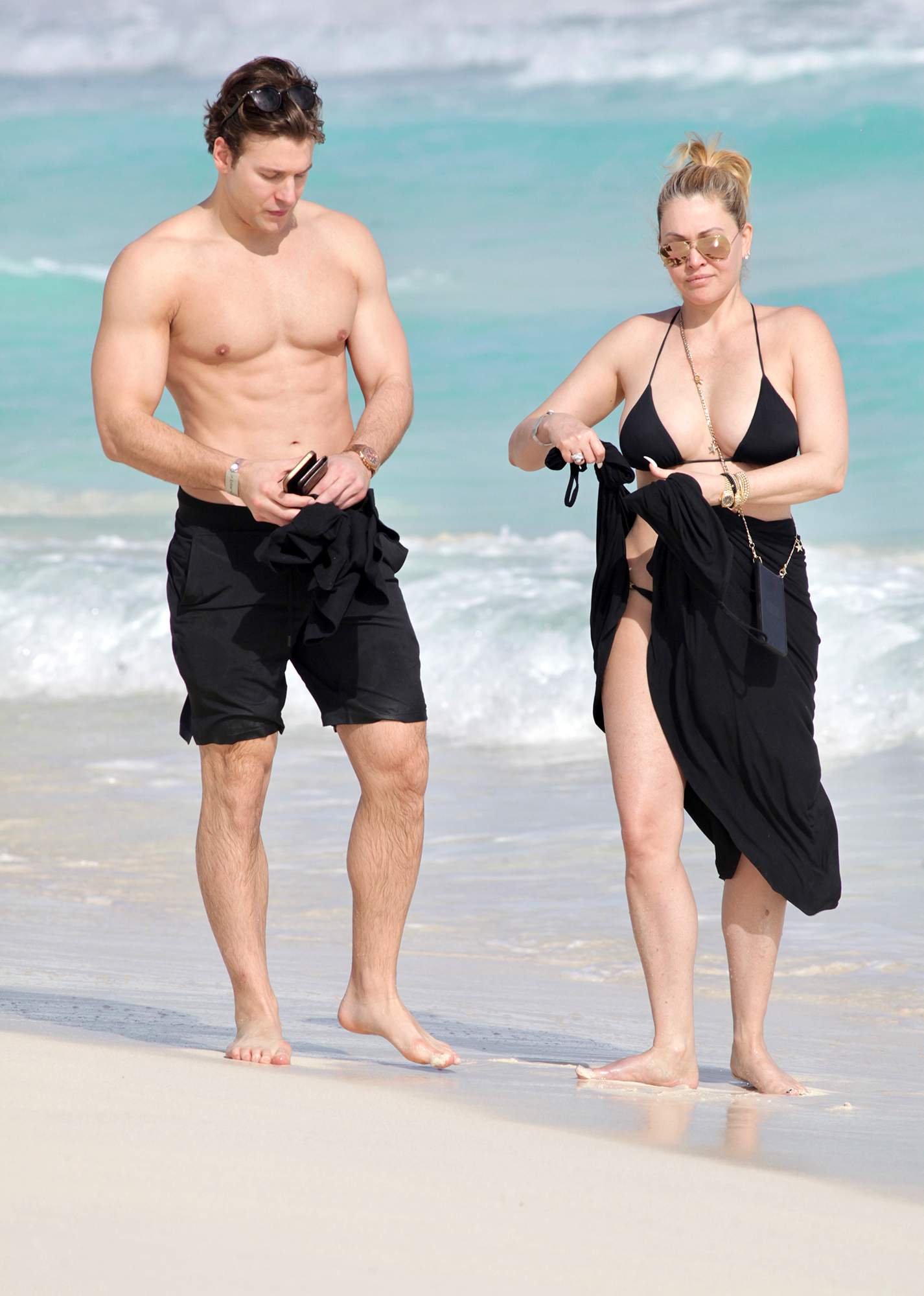 Shanna Moakler Stuns in a Black Bikini While Packing on PDA With Boyfriend Matthew Rondeau