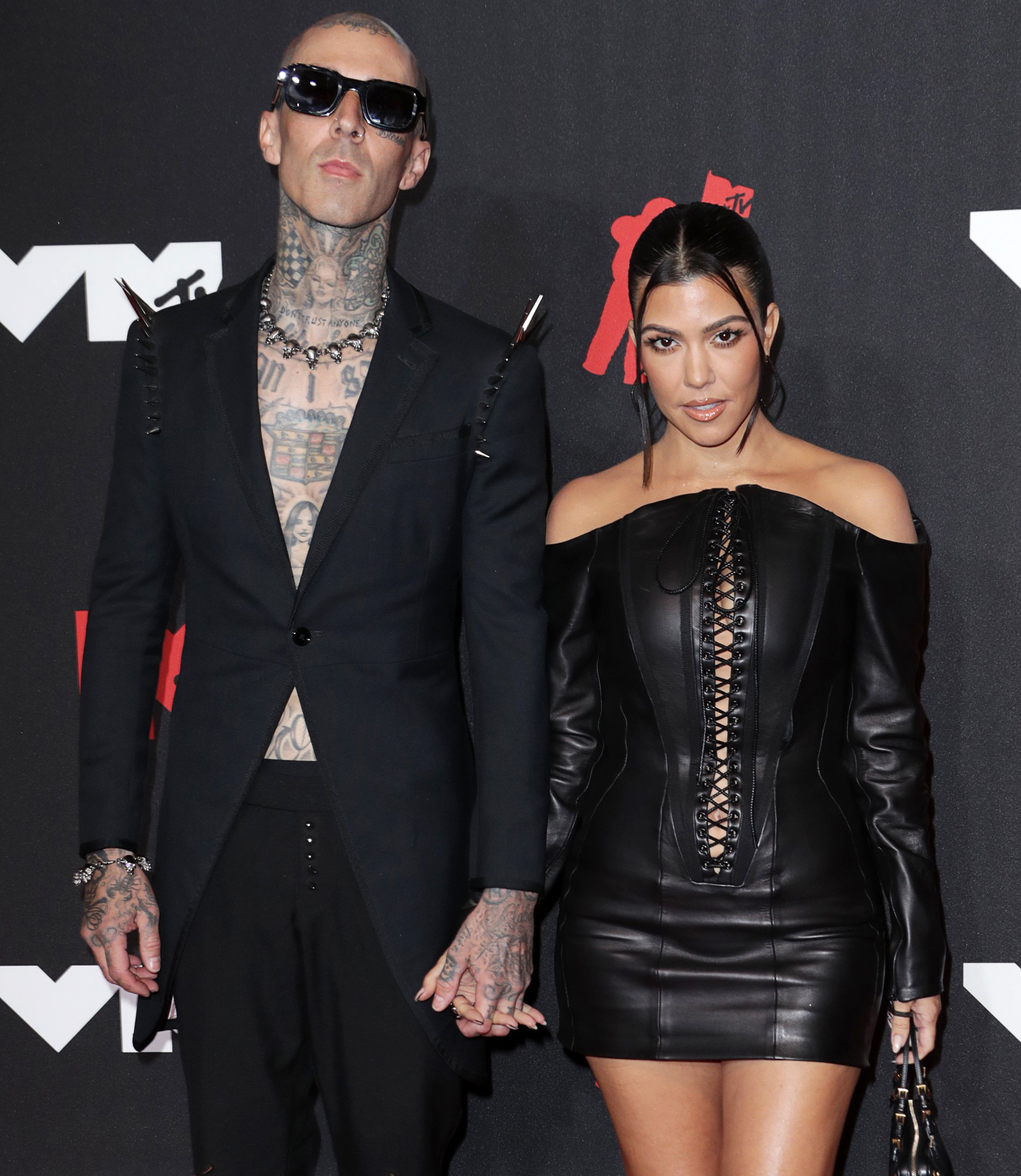 Kourtney Kardashian Claps Back At Troll for Travis Barker Punk Rock Reference: 'All of a Sudden'