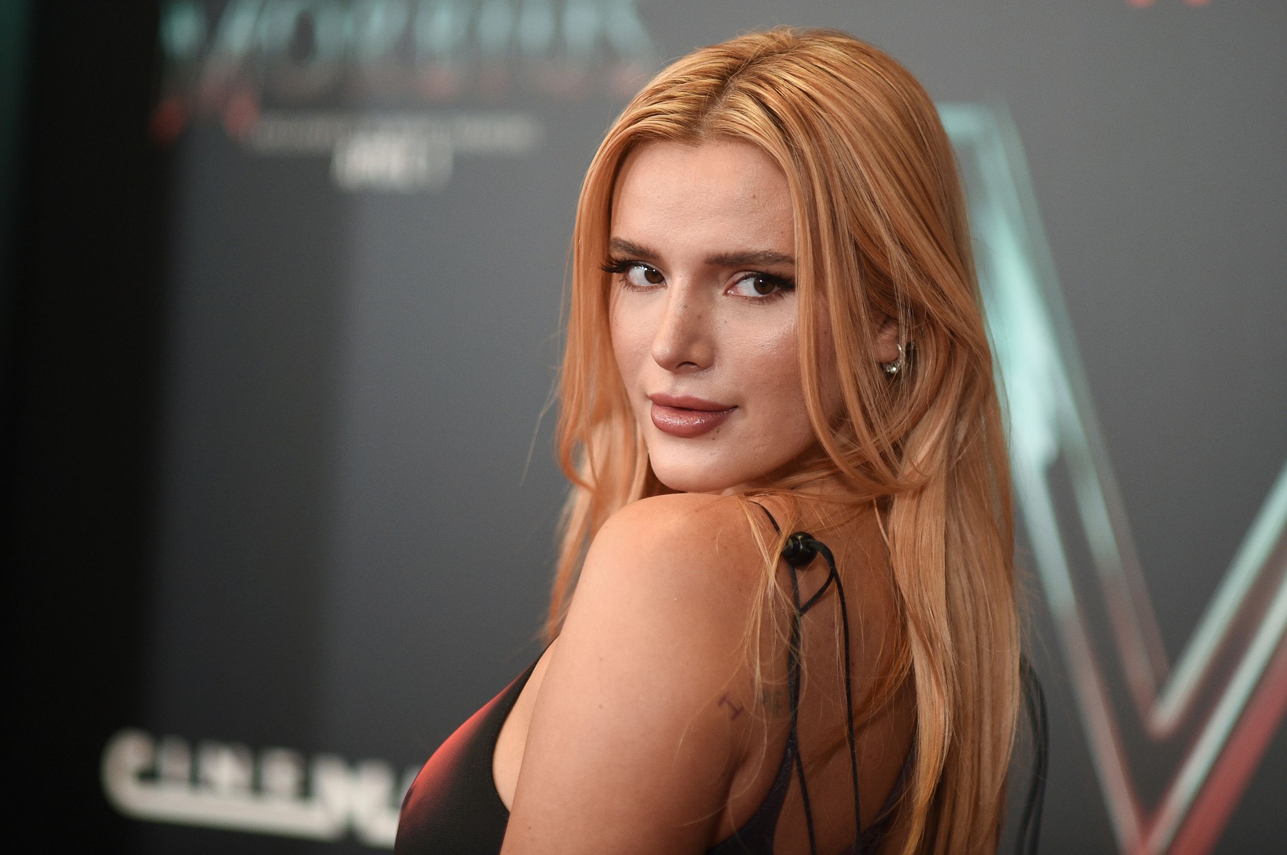 Bella Thorne Bares It All in Skin-Tight Dress See Photos photo