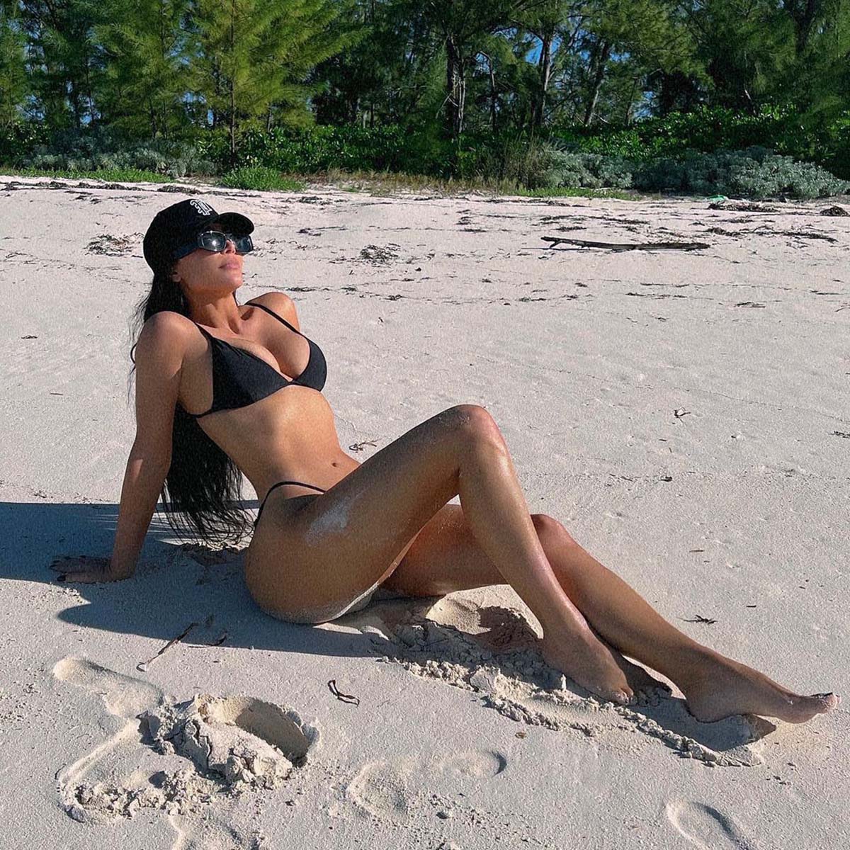 Kim Kardashian Bares Booty in Black Bikini Top Amid Pete Romance