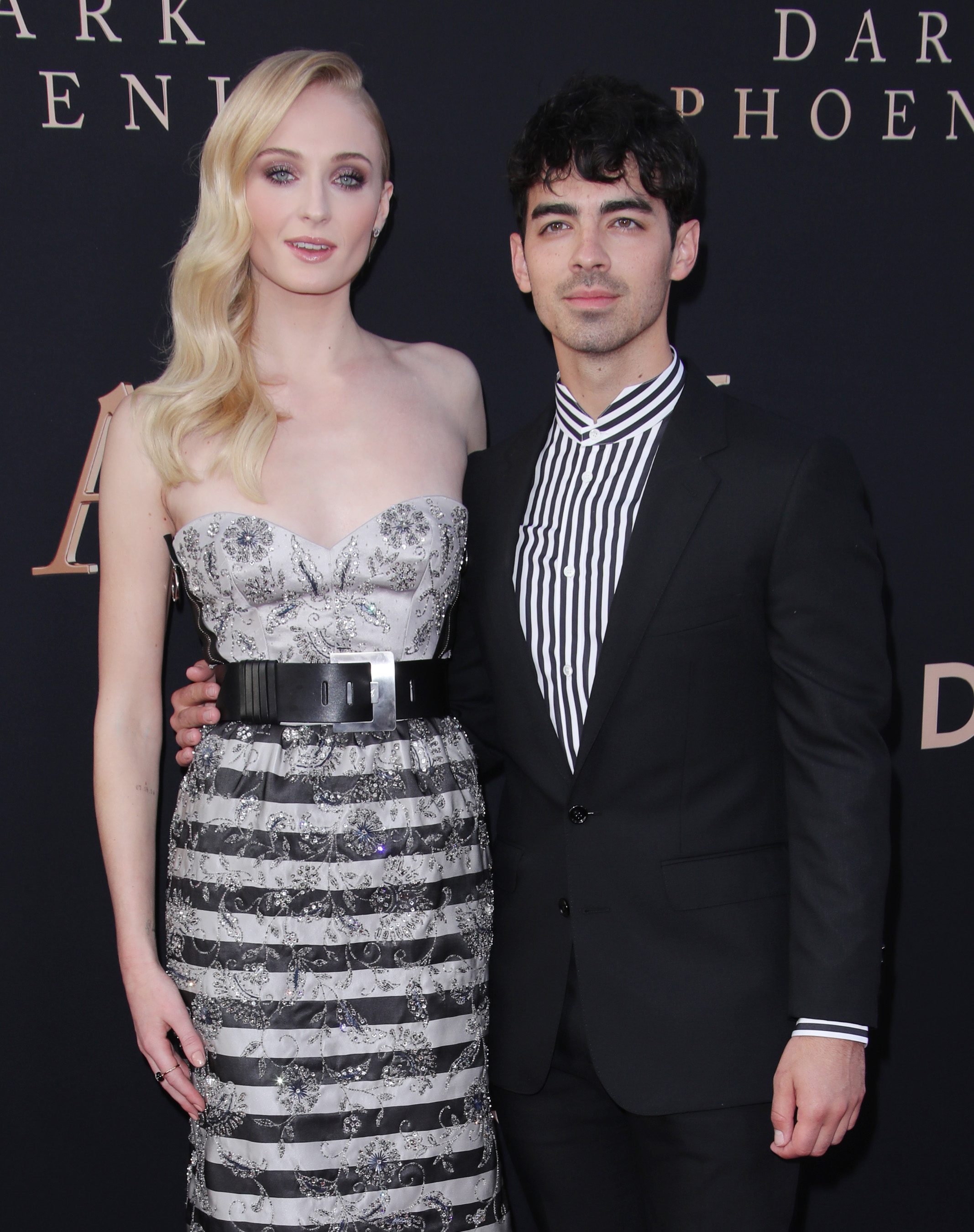 Joe Jonas Striped Shirt Black Suit Sophie Turner Strapless Striped Dress Dark Phoenix Premiere