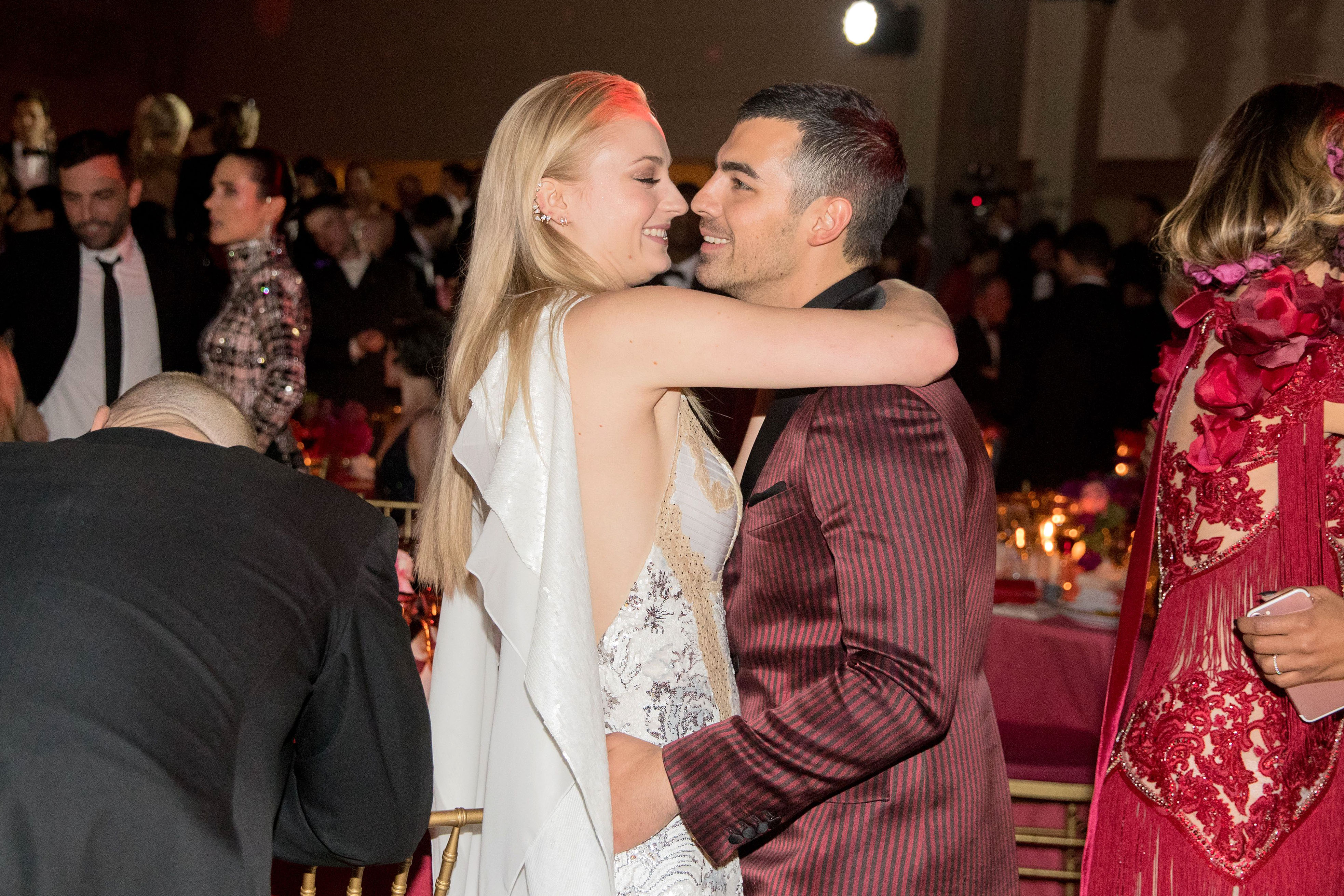 Sophie Turner White Gown Met Gala 2017 Joe Jonas Maroon Suit Kissing