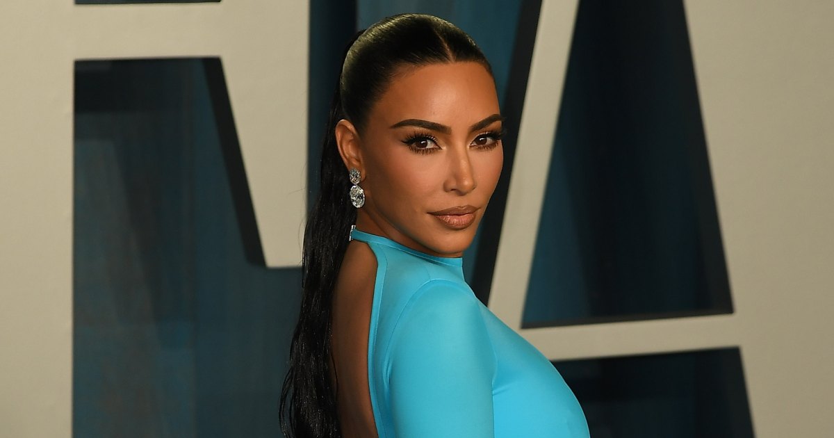 Kim Kardashian Models Shapewear Secretly Under Open-Back