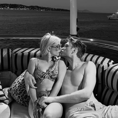 Emma Roberts Seemingly Goes IG Official With New Boyfriend Cody John in Kissing Photos