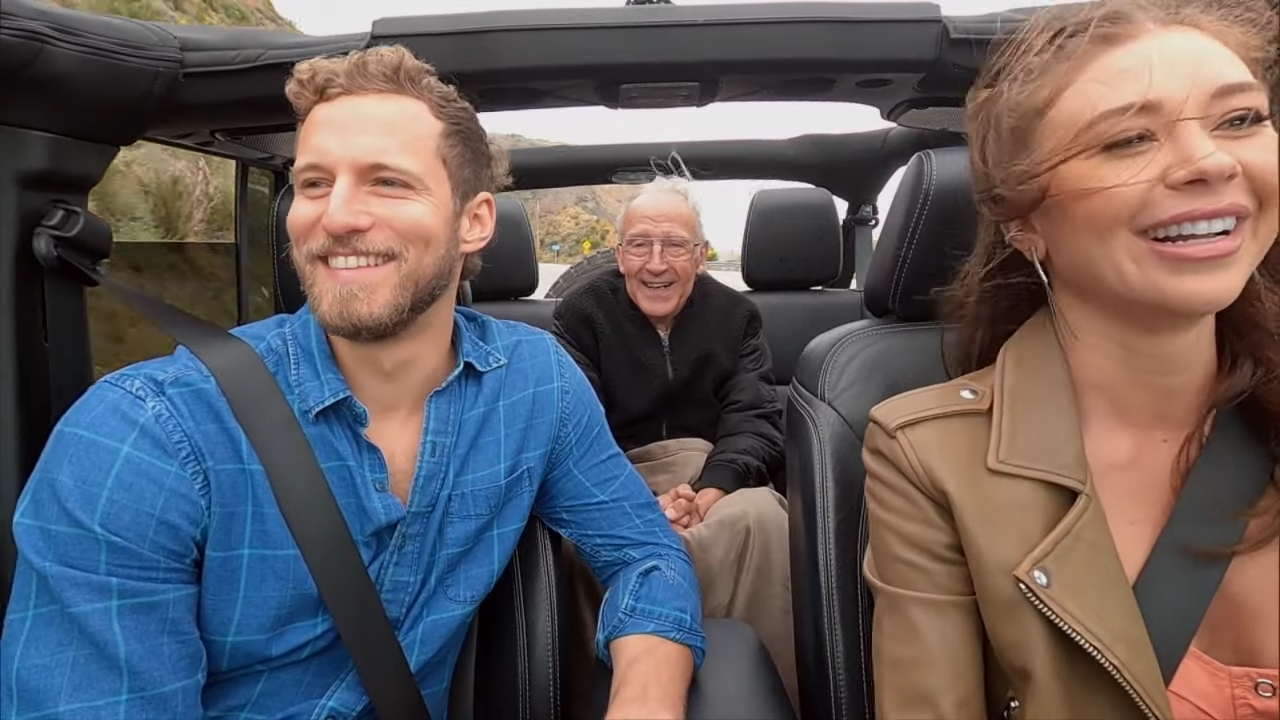Gabby and Erich in car with grandpa John