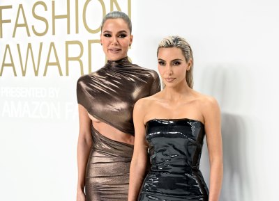 khloe kardashian kim kardashian wearing gold and black dresses