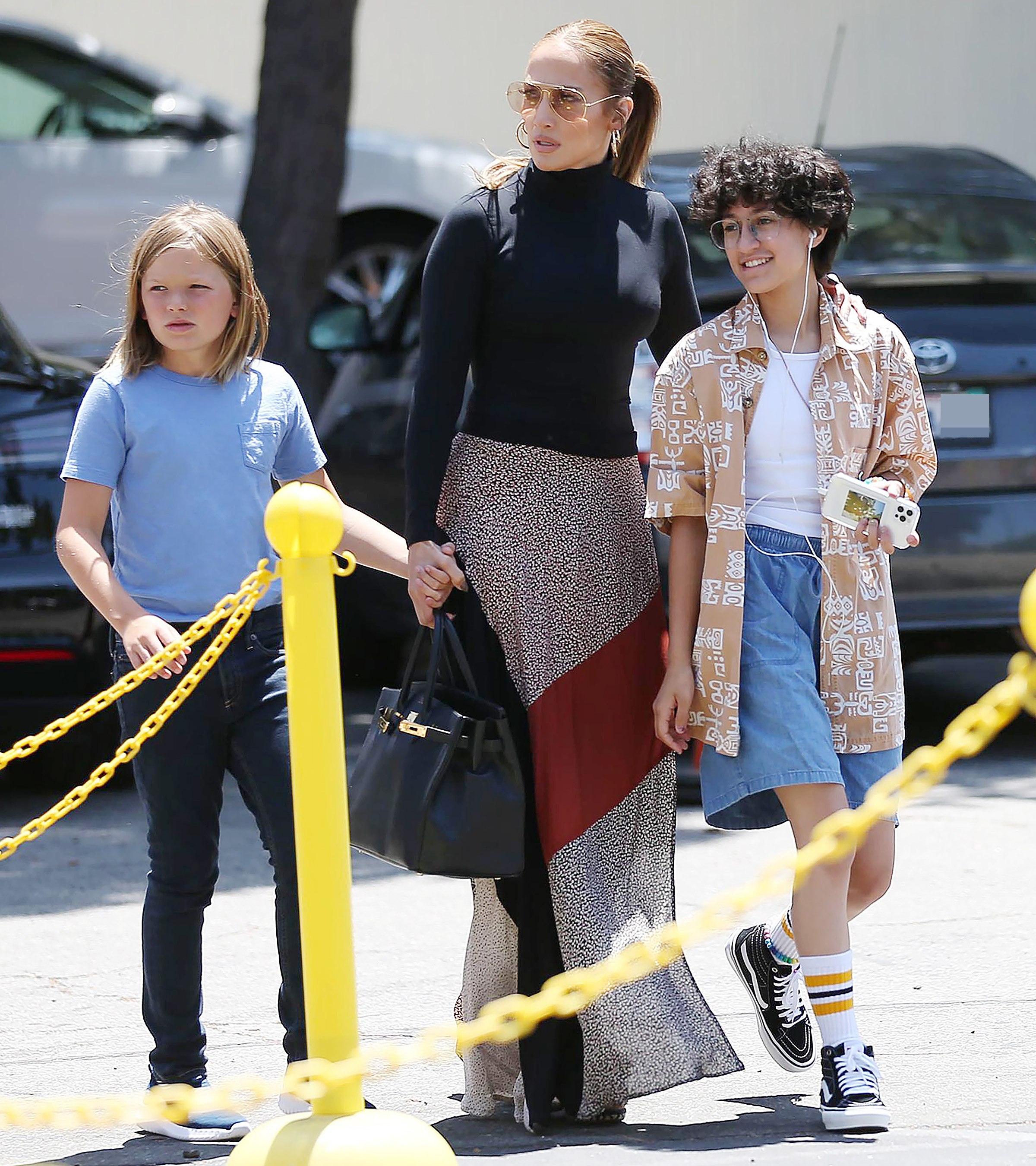 Jennifer Lopez, Child Emme Wear Opposite Summer Styles
