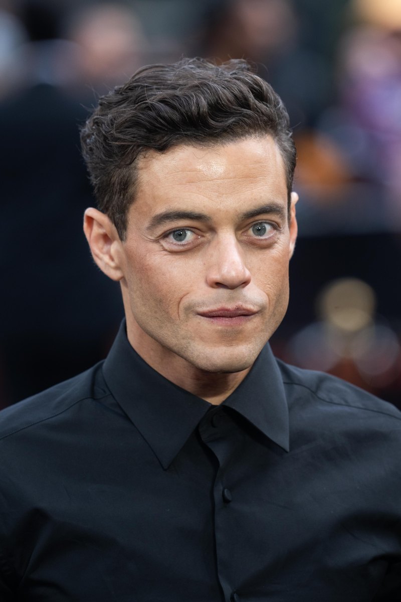 Rami Malek wearing a black suit at the Oppenheimer premiere