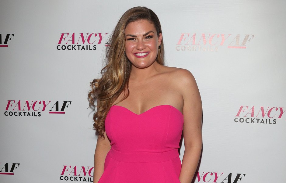 Brittany Cartwright wearing a pink strapless jumpsuit on the red carpet