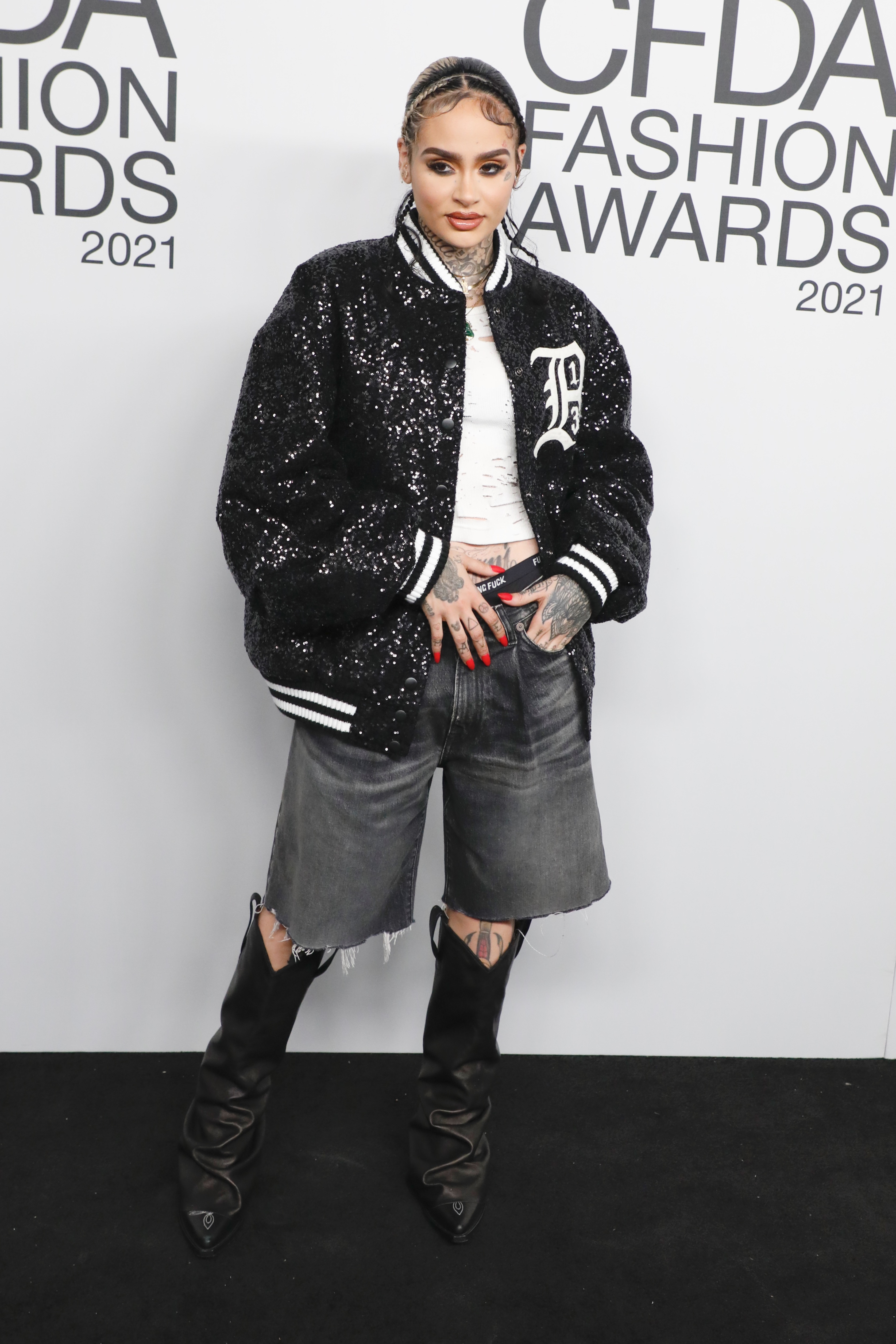 Kehlani appearing at the CFDA Fashion Awards wearing a black sparkling bomber jacket