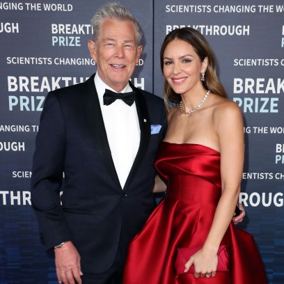 David Foster and Katharine McPhee posing on the red carpet