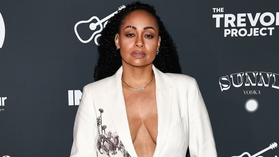Raven-Symone wearing an all-white pantsuit at the Pride Eve celebration