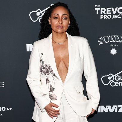 Raven-Symone wearing an all-white pantsuit at the Pride Eve celebration