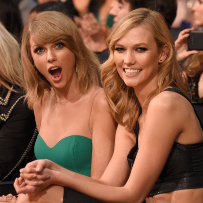 Taylor Swift and Karlie Kloss sitting in the audience at the 2014 American Music Awards