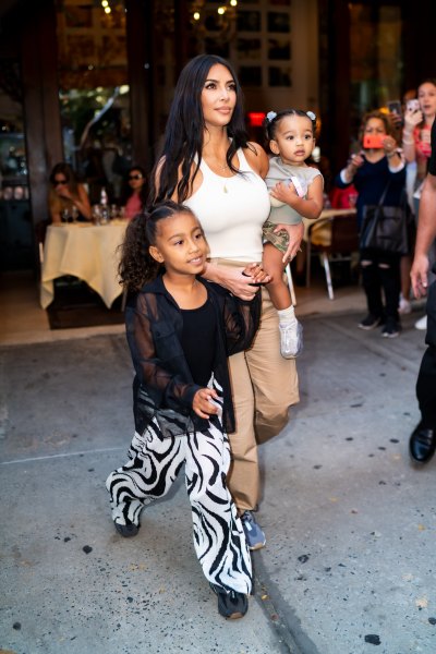 Kim Kardashian, North West, and Chicago West walking