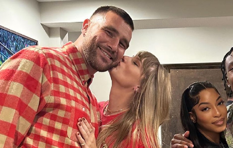taylor-swift-kisses-travis-kelce-first-photo