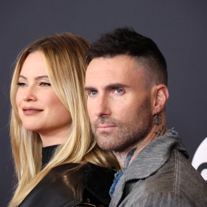 Behati Prinsloo and Adam Levine, seen here at the 38th Annual Rock & Roll Hall of Fame Induction, share three kids.