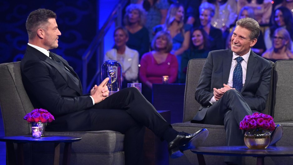 'Golden Bachelor' star Gerry Turner sits on stage in a suit during the 'Women Tell All' special