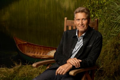 Gerry Turner sits in a chair in a promo photo for 'The Golden Bachelor'