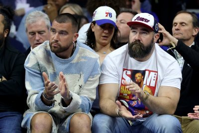 Travis Kelce and Jason Kelce at a Boston Celtics game.