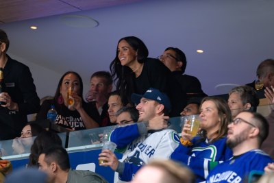 meghan markle beams on hockey game date night with prince harry