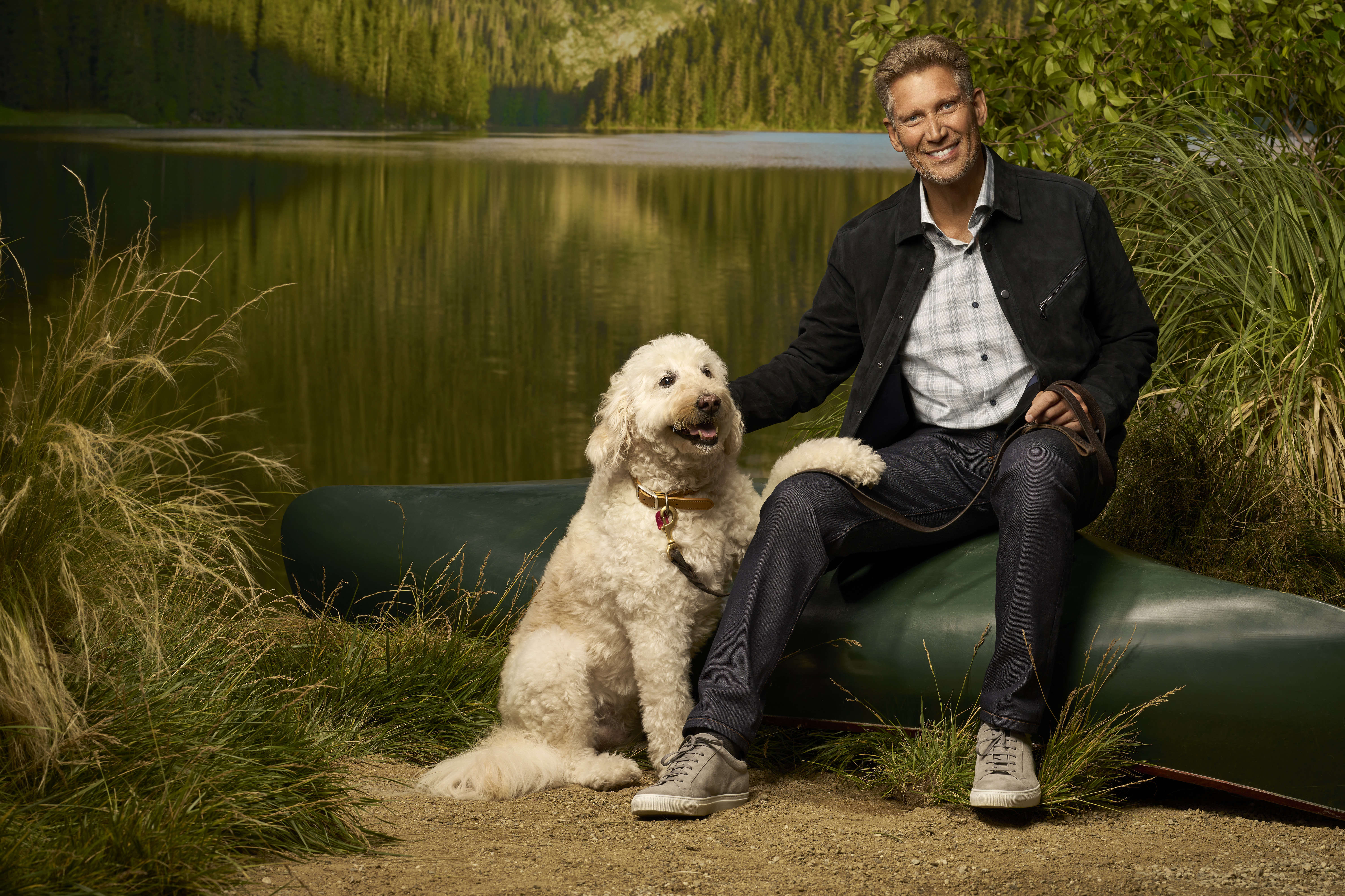 Gerry Turner poses next to his dog for a promo pic