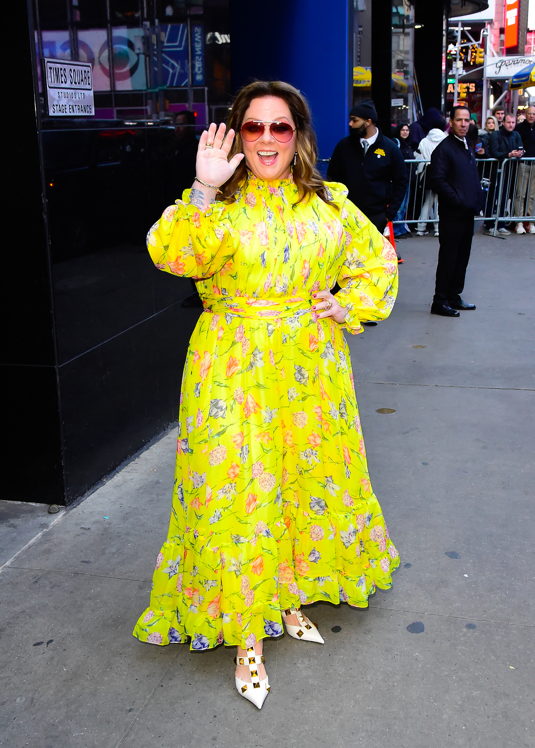 Melissa McCarthy seen wearing a yellow floral dress on the streets of New York City.