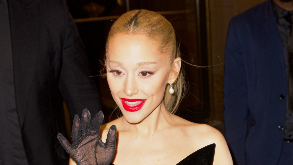 Ariana Grande wears an all black dress with black gloves