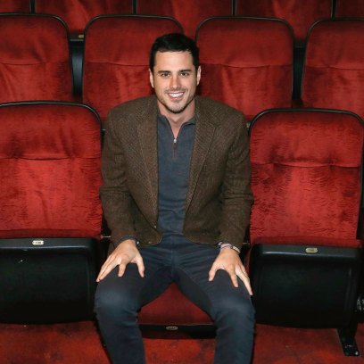 Ben Higgins wearing a brown jacket while sitting in theater seats.