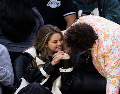 selena gomez and benny blancos pda at lakers game