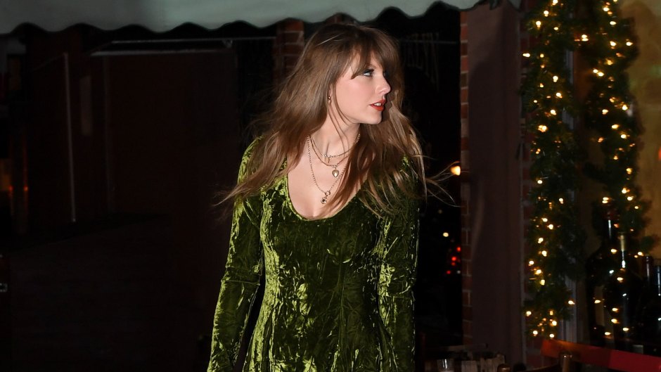 Taylor Swift wears a green crushed velvet dress with thigh high boots