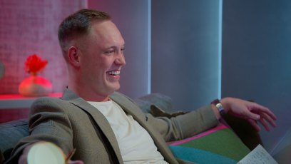 Love Is Blind's Jimmy Presnell wearing a blazer and t-shirt in the pods.