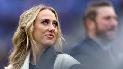 Brittany Mahomes wearing a white jacket