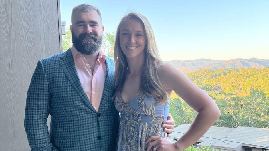 Jason Kelce and Kylie Kelce pose for a photo at a wedding.