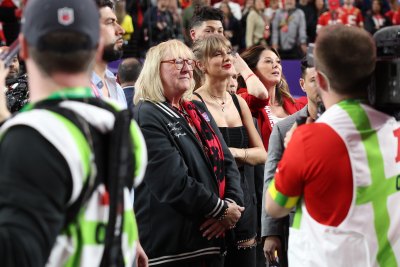 Taylor Swift and Travis Kelce's Mom Donna Watch as He Accepts Vince Lombardi Trophy