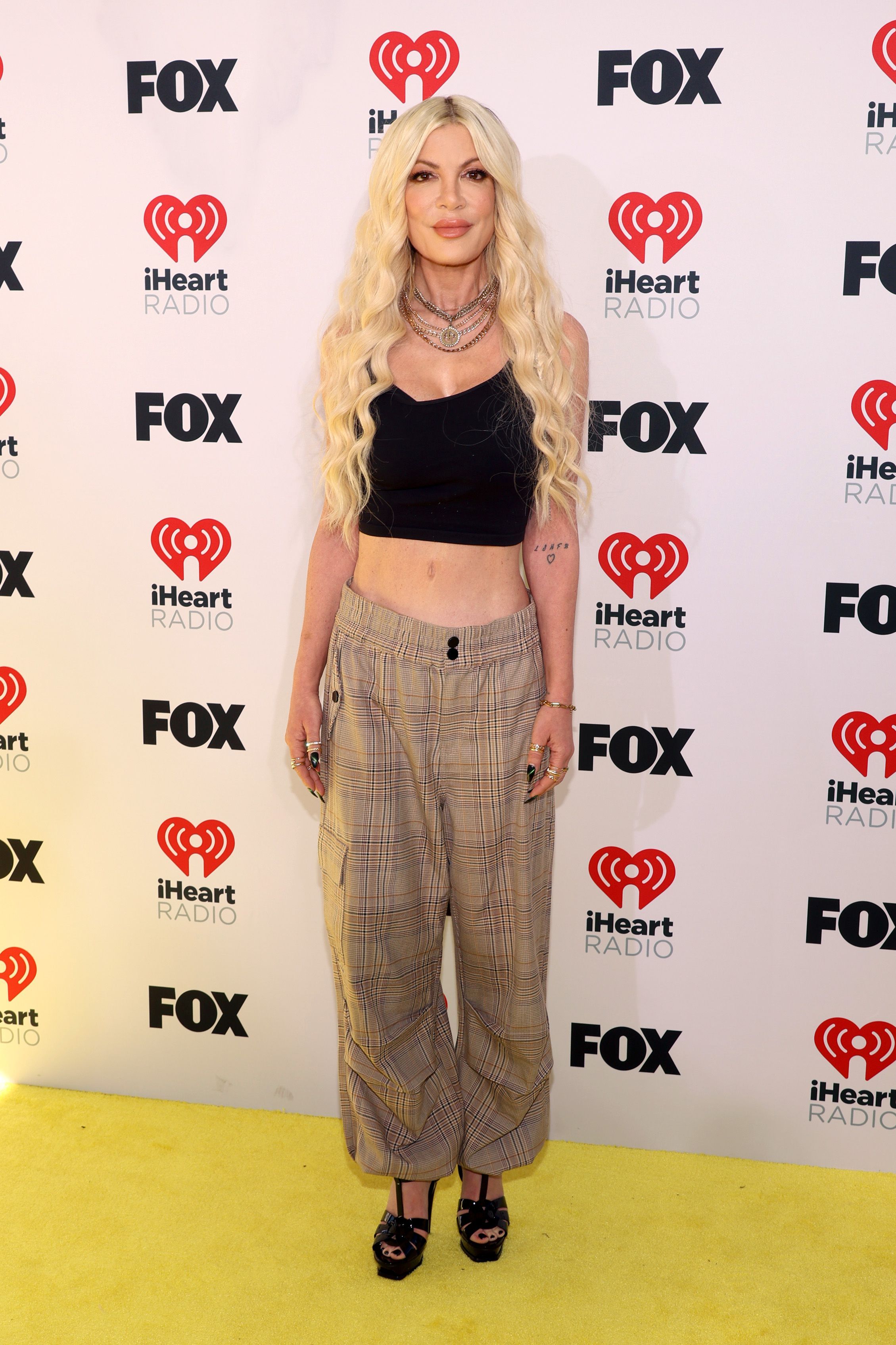 Tori Spelling attends the 2024 iHeartRadio Music Awards