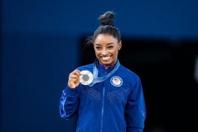 Simone Biles Wears Walking Boot After Olympics Calf Injury