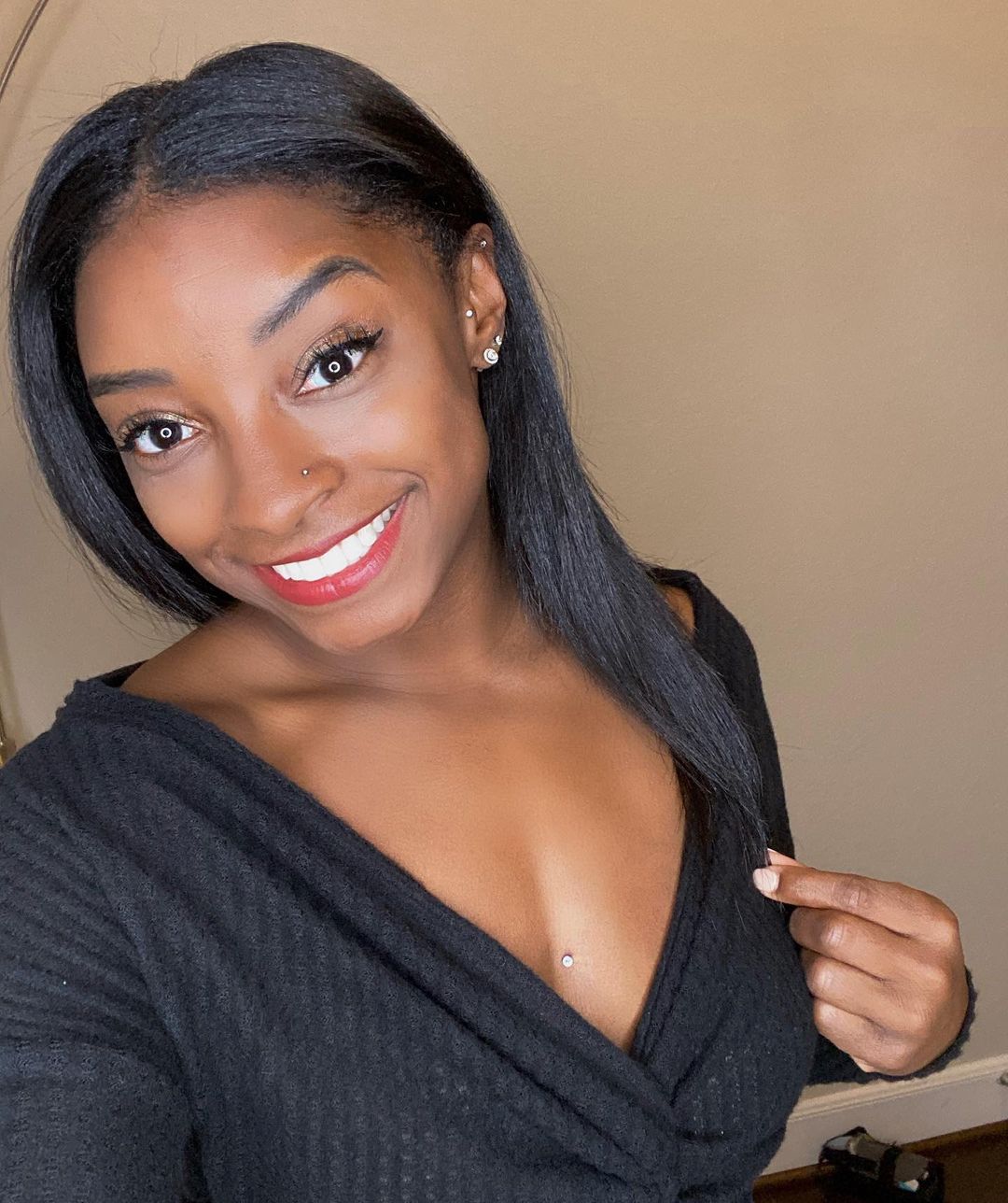 Simone Biles’ Body Piercing: Sternum, Nose, Nipples