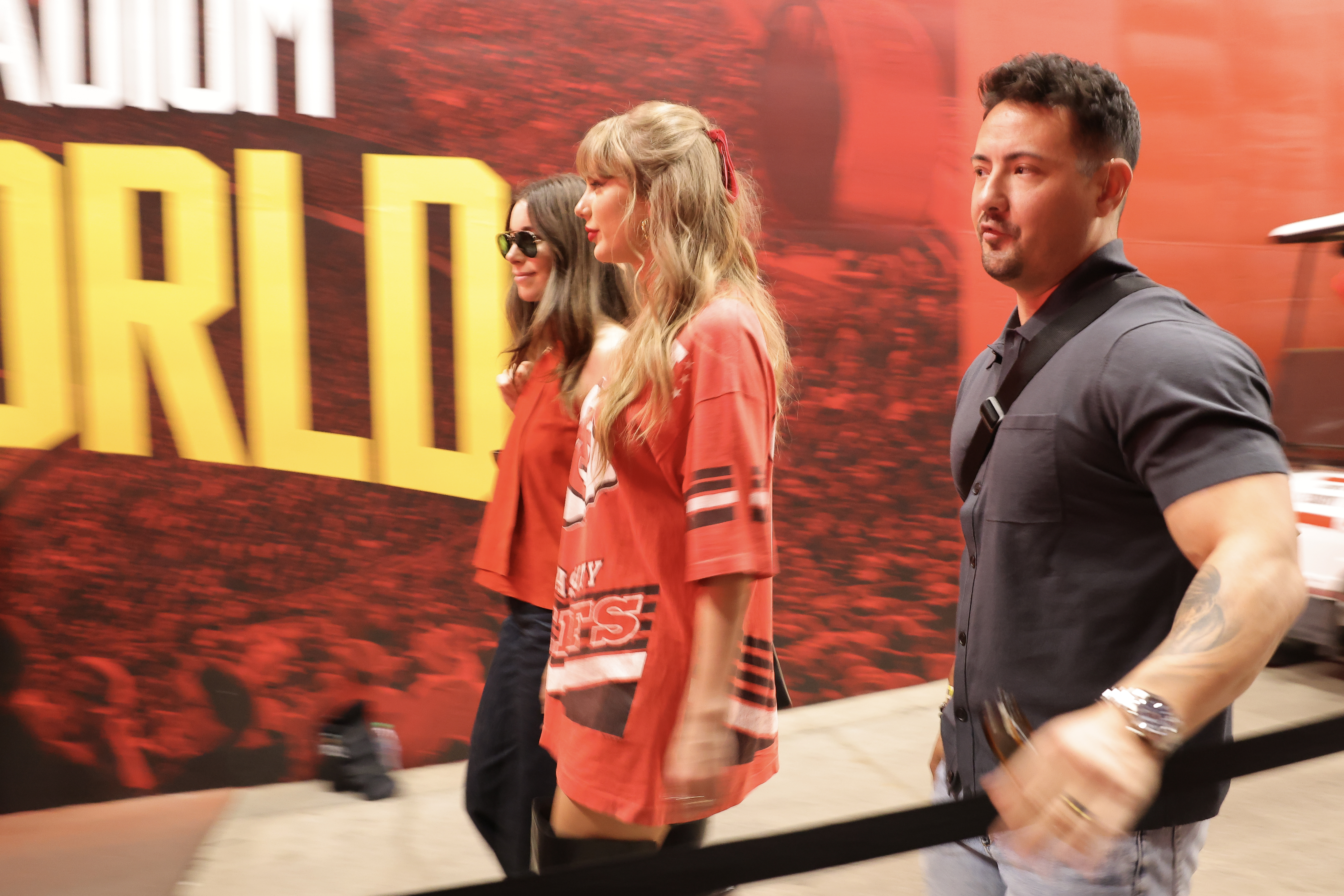 Taylor Swift Supports Travis Kelce While Wearing Chiefs Dress