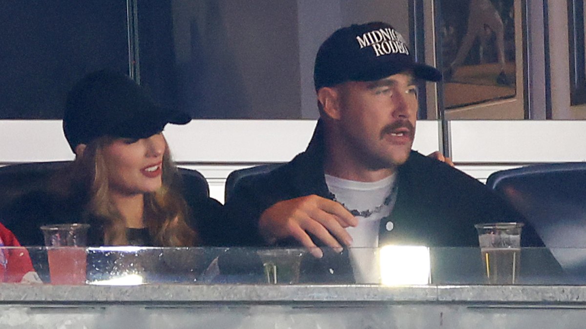 Taylor Swift Feeds Travis Kelce Her Drink at Baseball Game