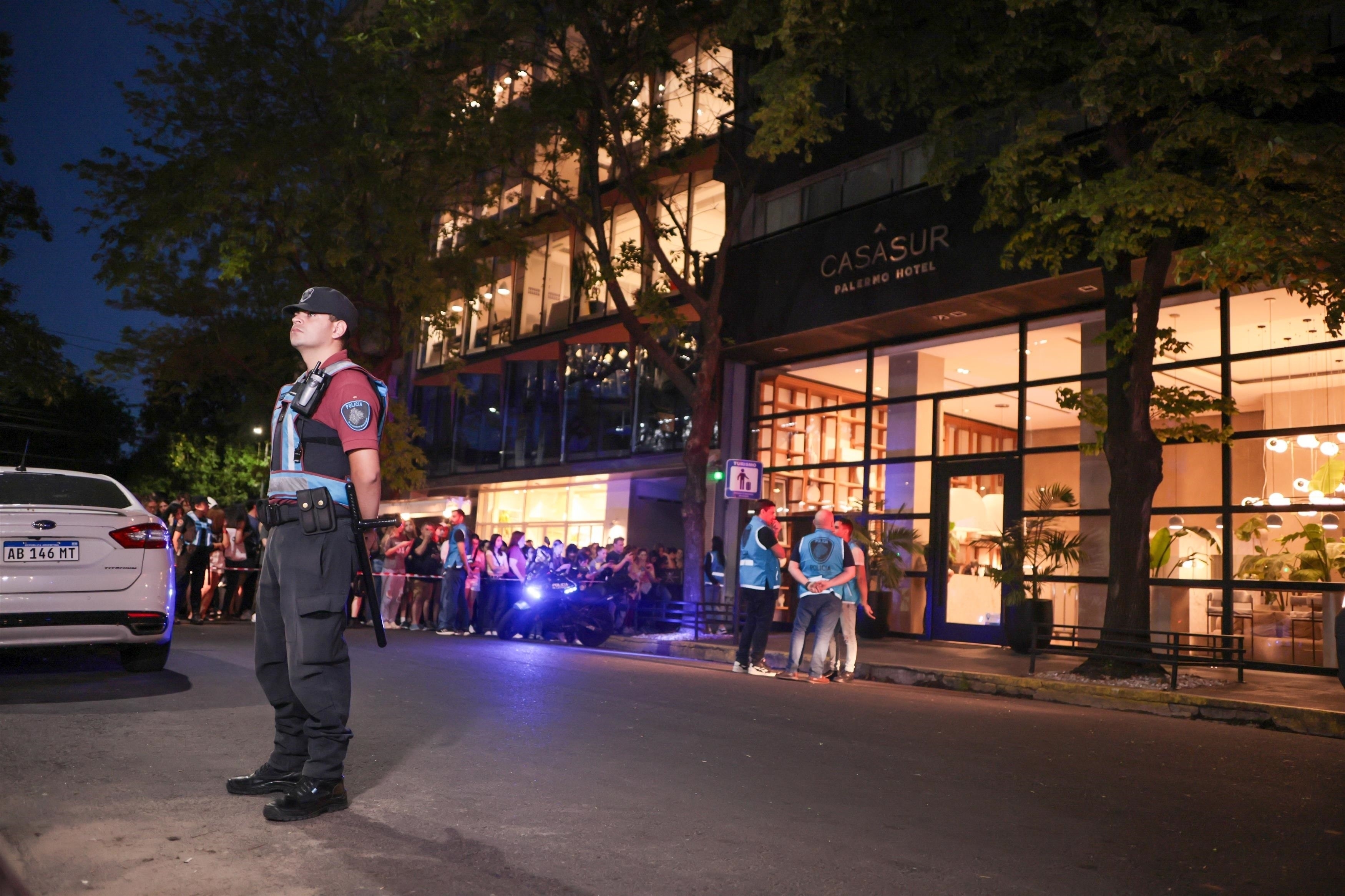 fans gather outside liam payne hotel casa sur as authorities close off street after death