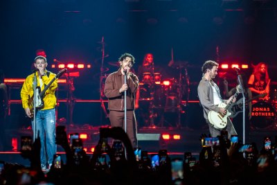 Nick Jonas Runs Off Stage in Prague After Laser Aims at His Head