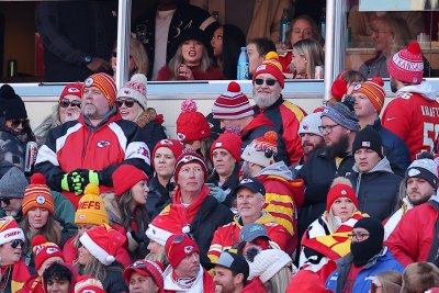 Taylor Swift Celebrates Chiefs’ Undefeated Season With Group Hug