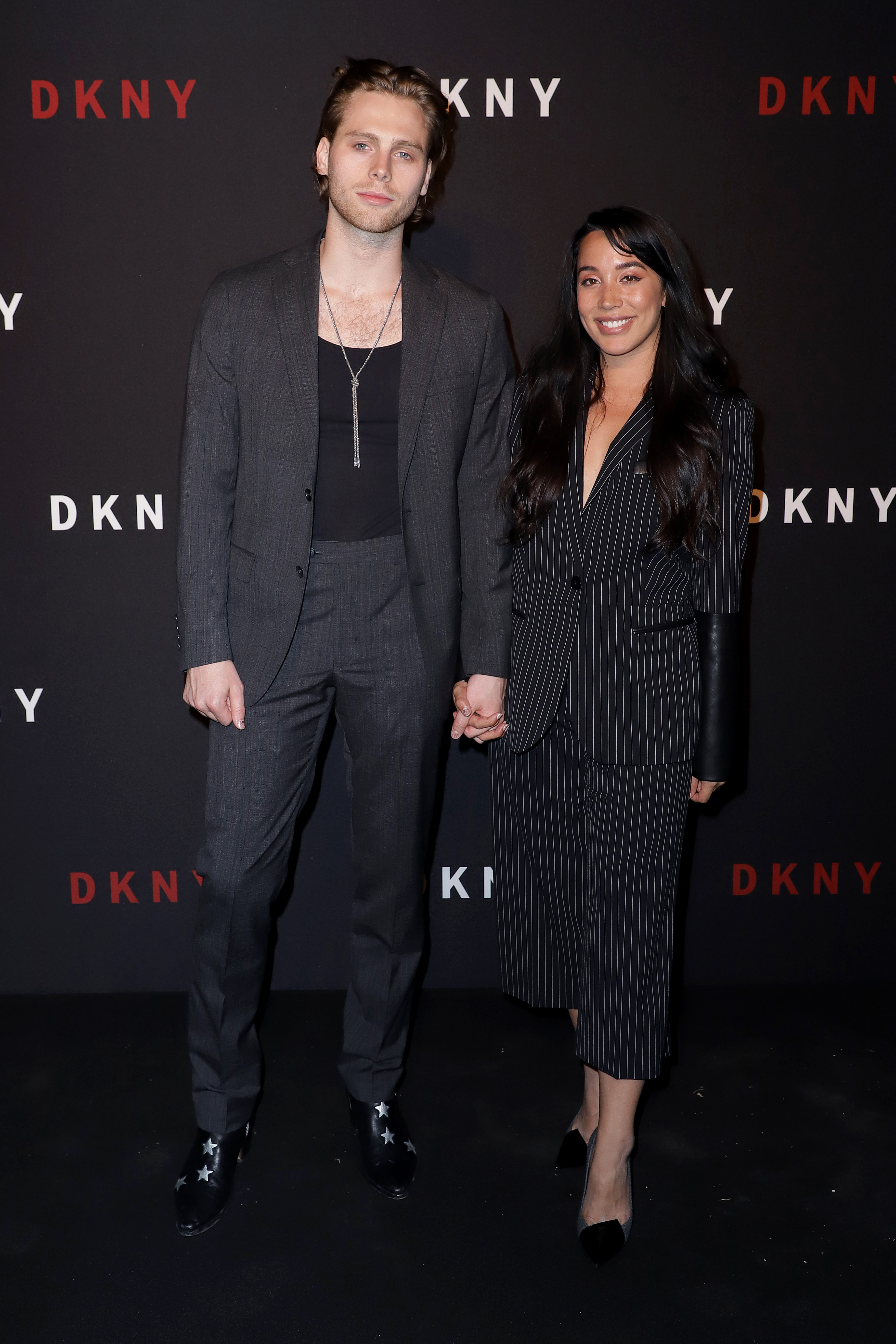 NEW YORK, NEW YORK - SEPTEMBER 09: Luke Hemmings (L) and Sierra Deaton attend as DKNY turns 30 with special live performances by Halsey and The Martinez Brothers at St. Ann's Warehouse on September 09, 2019 in New York City. (Photo by John Parra/Getty Images for DKNY)